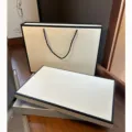 Luxury cream gift box set with black border, premium paper bag and lid box packaging. - White Lid and Base Gift Boxes with Chain