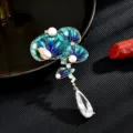 Elegante broche de loto de estilo chino con esmalte, perlas y cristal para abrigos y trajes. - Broche de Flor de Loto