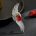 Prachtige luxe phoenix broche met rode edelsteen en sprankelende zirkon vleugels voor stijl. - Feniks Broche / Goud/Rood