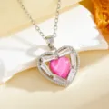 Detailed close-up of the elegant heart-shaped pendant necklace with sparkling cubic zirconia. - Pink Diamond Heart Necklace / Silver