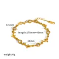 Gold stainless steel dolphin bracelet with cubic zirconia heart charms and extension chain. - TB5287