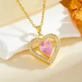 Gold heart pendant necklace featuring a sparkling pink cubic zirconia stone and delicate crystal details. - Teardrop Heart Style (T014) / Gold Pink Stone