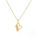 Detail shot of the golden heart pendant necklace featuring sparkling pink marquise and clear stones. - Heart Leaf With Pink Stones(T059) / Gold