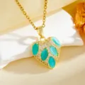 Gold heart necklace with turquoise marquise stones and sparkling clear zirconia crystals. - Heart With Five Blue Stones(T059) / Gold