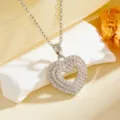 Elegant double-layer pavé cubic zirconia heart pendant necklace with delicate chain. - Triple Layer Hollow Heart(T059) / Silver