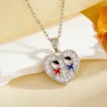 Heart shaped crystal rhinestone pendant necklace detail view, stylish silver chain accessory. - Red And Blue Eyes Heart(T059) / Silver