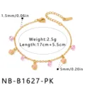 Goldfarbenes Edelstahlarmband mit rosa Strass-Blumen-Anhängern, stilvoller süßer Schmuck. - Armband / Rosa