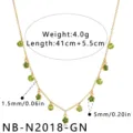 Stainless steel gold chain necklace with green crystal pendants and small flower charms for women. - Necklace / Green