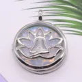 Silver hollow lotus yoga pendant necklace with glowing opal stone for meditation jewelry. - Opal