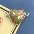 Conector de pulsera de piedra natural en forma de corazon con borde plateado para joyeria DIY. - 15x23mm / Unakita