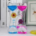 Creatief vloeibaar beweging zandloper speelgoed, bureau decoratie en stressverlichting timer. - Kleurrijk hart blauw en roze