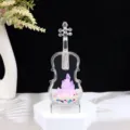 Gedetailleerd uitzicht van de transparante acryl viool vloeibare ornament met kasteel. - Viool lichtgevend zandkasteel type B