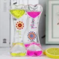 Dubbel hart vloeibare beweging bubbler speelgoed olie zandloper bureau decoratie - Nieuwe windmolen roze en geel