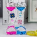 Creatief dubbel hart vloeistof beweging speelgoed, kleurrijke olie zandloper met wiel. - Nieuwe windmolen blauw en roze