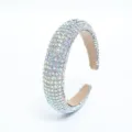 Detailed shot of a luxury rhinestone headband, sparkling crystal hair accessory for elegant women. - AB Color