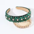 Detail shot of retro green crystal flower headband with pearls and velvet finish. - Green