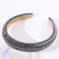 Close-up detail of the sparkling rhinestone padded headband, showcasing exquisite crystal craftsmanship. - Gray