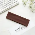Fascia per capelli sportiva marrone tinta unita da donna, elastico morbido per yoga e fitness corsa. - Marrone