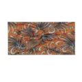Fascia per capelli sportiva arancione donna yoga corsa anti sudore elastica dettaglio vista - Ambra
