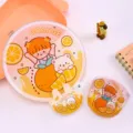 Cute cartoon orange folding fan with storage pouch, portable mini fabric round fan. - Good Fortune Orange