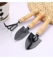 Mini garden tool set with three pieces including shovels and rake for potted plants planting. - Thick Handle 3-Piece Set