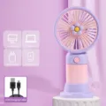 Portable handheld mini USB rechargeable desk fan with stand and cute flower design. - Purple [Flower - Rechargeable Model]