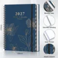 Agenda settimanale e mensile 2027 con elegante copertina floreale dorata e spirale. - Fiori dorati - 2027