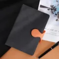 Dark grey hardcover notebook with bright orange magnetic buckle, perfect for office or school. - Honeycomb Pattern Black with Brown Buckle