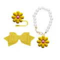 Detailed view of cute yellow flower straw cover, glitter bow, and pearl cup chain accessories. - Yellow