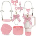Ensemble d'accessoires de tasse en silicone rose avec sangle de perles et pendentif nœud. - Rose