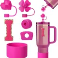 Pink silicone tumbler accessories set including straw covers, protective boot, letter charm. - Letter I