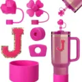 Pink Stanley tumbler accessory set with silicone boot straw covers and letter J patch. - Letter J