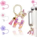 Set di accessori per bottiglia d'acqua con portachiavi lettera in resina e copripaglia fiore. - Lettera H