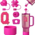 Pink Stanley cup accessories set including straw covers, letter Q patch, and silicone boot. - Letter Q