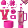 Pink Stanley tumbler accessories set with letter V patch, heart straw covers and silicone boot. - Letter V