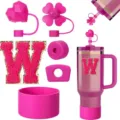 Pink Stanley tumbler accessories set including silicone boot, cute straw covers, and letter patch. - Letter W