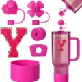 Pink Stanley cup accessories set including cute straw covers, letter Y patch, and silicone boot. - Letter Y