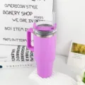 Detail shot of large insulated tumbler with handle and straw in purple for daily hydration. - 1.1L-2L / Purple