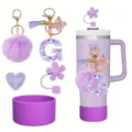 Purple tumbler accessories set with straw cover, letter G keychain, and silicone boot. - Style G