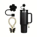 Black stainless steel tumbler set with silicone flower straw cover and gold butterfly chain. - Black