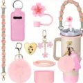 Pink tumbler accessories set including cherry blossom straw cover braided handle and cute pom pom charm - Pink