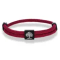 Detailed view of red woven rope bracelet showcasing black metal square bead with tree motif. - Tree of Life Woven Bracelet (Red and Black) / Black