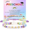 Close-up detail of colorful clay bead graduation bracelets with cross and letter charms. - Style 24