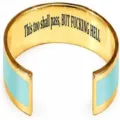 Detail view of the stainless steel open cuff bracelet with inner laser engraved inspirational text. - Classic Inlaid Style / Green & Gold