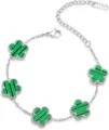 Detailed close-up of the green clover motif and silver chain links of the fashion bracelet. - Peacock Color + Steel - 12