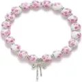 Detailed close-up view of the ceramic floral bead stretch bracelet featuring a bow charm. - Blue Floral Style 4