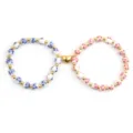 Matching ceramic floral beaded friendship bracelets with gold heart magnetic clasp. - Couple Bracelet Style 11
