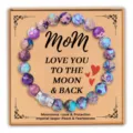 Gros plan détail du bracelet de perles en jaspe impérial et pierre de lune thème maman. - Jaspe impérial avec carte Mom et pierre de lune de qualité 5A