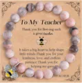 Teacher appreciation beaded bracelet detail view featuring pink jasper beads and cute bee charm. - Pink Zebra Jasper Bee - 10