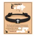 Black woven rope bracelet with white cross charm on Easter greeting card gift package. - Cross Woven Bracelet (Easter Card) / Black